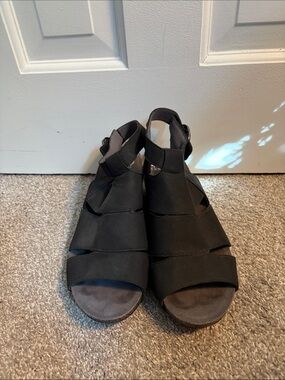 Dansko Black Slip-On Clog Sandal with Silver Buckle